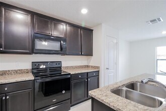 1187 Moyle Way in Mascotte, FL - Building Photo - Building Photo