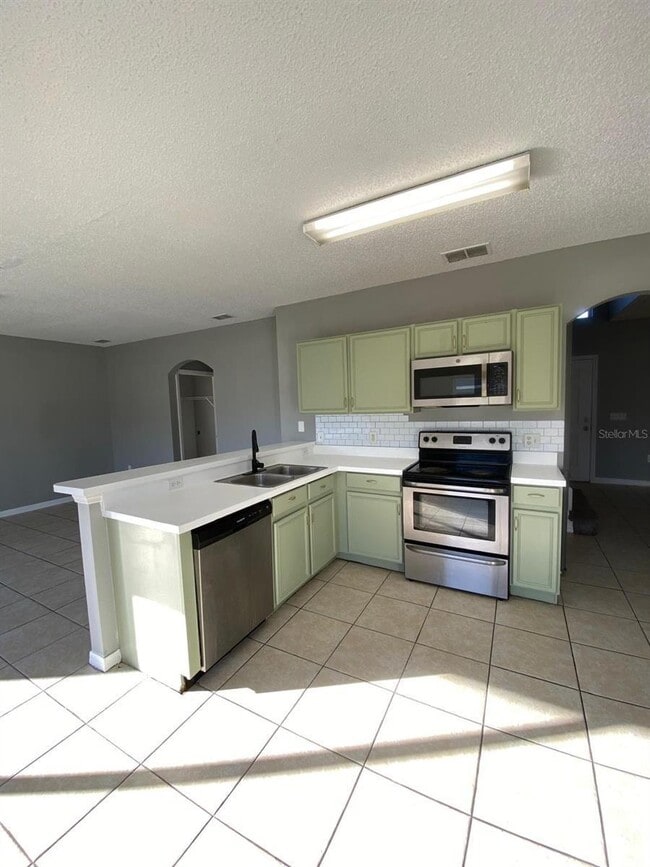 606 Bluebill Ct in Kissimmee, FL - Foto de edificio - Building Photo