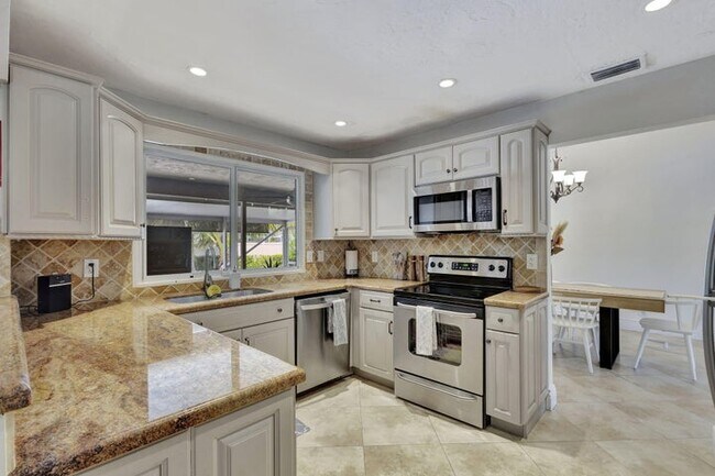 1104 Jackpine St in Wellington, FL - Foto de edificio - Building Photo