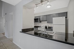 Experience Dallas living at Village Oaks A...