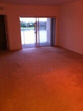 1145 Golden Lakes Blvd, Unit 715 in West Palm Beach, FL - Building Photo - Building Photo