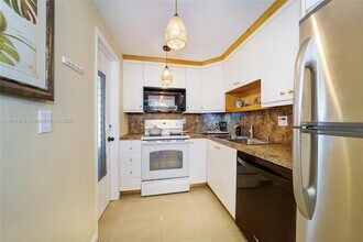 1040 SE 4th Ave, Unit 128 in Deerfield Beach, FL - Building Photo - Building Photo