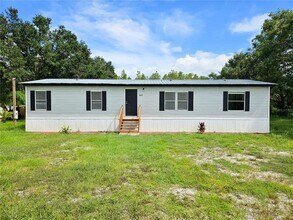 4129 Woodsridge Dr in Polk City, FL - Building Photo - Building Photo
