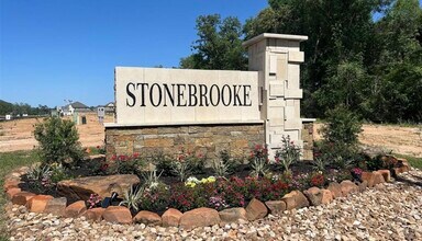 9411 Hard Rock Rd in Conroe, TX - Foto de edificio - Building Photo