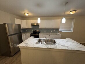 9011 E 12th Ave in Aurora, CO - Building Photo - Building Photo
