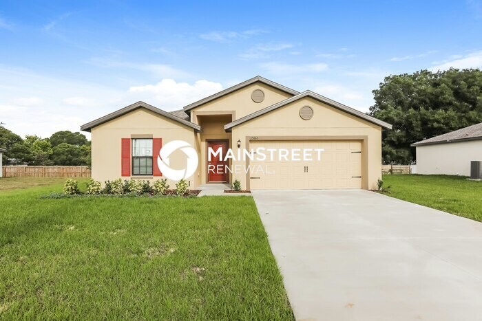 35665 Rose Moss Ave in Leesburg, FL - Foto de edificio