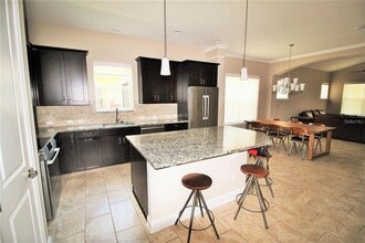 7909 Laureate Blvd in Orlando, FL - Building Photo - Building Photo