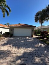 5548 Islandwalk Cir in Naples, FL - Building Photo - Building Photo