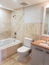 3540 Main Hwy-Unit -404 in Miami, FL - Building Photo - Building Photo