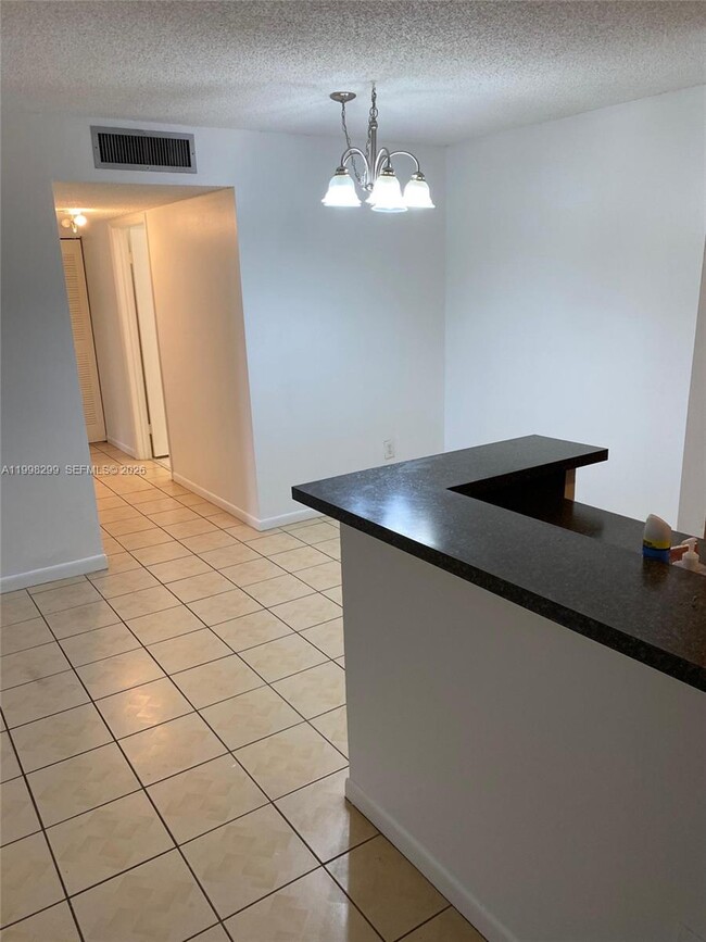 9608 W McNab Rd in Tamarac, FL - Building Photo - Building Photo