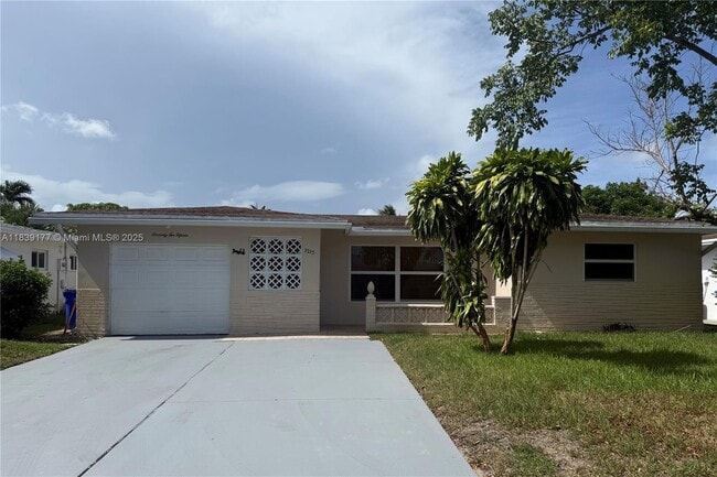 property at 7215 NW 8th St