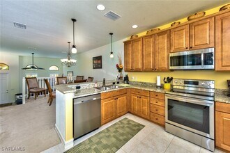 9102 Capistrano St S in Naples, FL - Building Photo - Building Photo