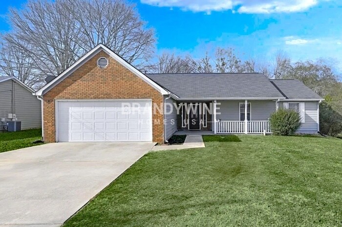 6057 Dorchester Dr in Rex, GA - Foto de edificio