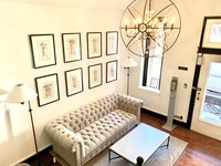 The Suites at 115 E Eager photo'