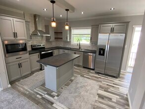 1990 Douglas Ln in Tarpon Springs, FL - Building Photo - Building Photo