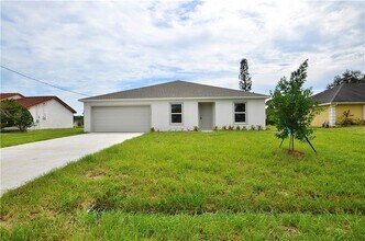 1426 SW Merchant Ln in Port St. Lucie, FL - Building Photo - Building Photo