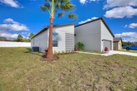 107 Lily Ln in Poinciana, FL - Building Photo - Building Photo