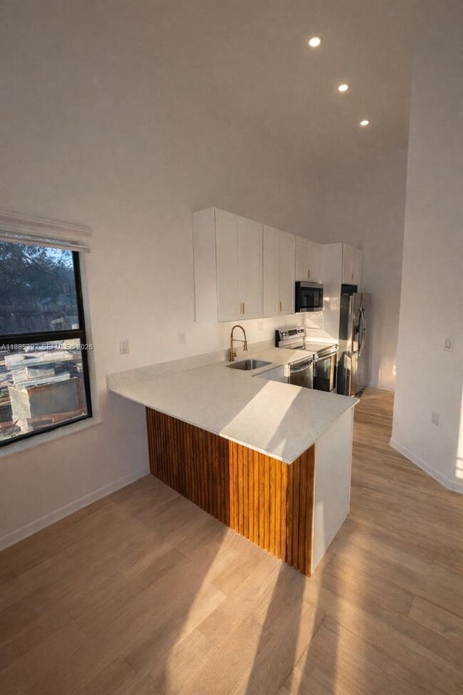 property at 7927 NW 16th Ave