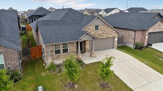 450 Durian Lp in Mustang Ridge, TX - Building Photo - Building Photo
