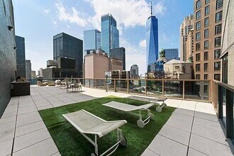 113 Nassau St in New York, NY - Building Photo - Building Photo