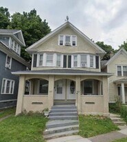 65 Woodlawn St in Rochester, NY - Building Photo