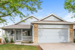 11594 Oswego St in Henderson, CO - Building Photo