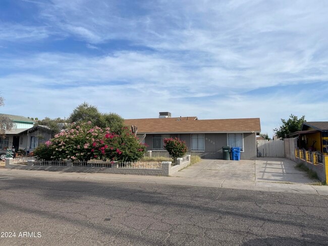 property at 8333 W Roma Ave