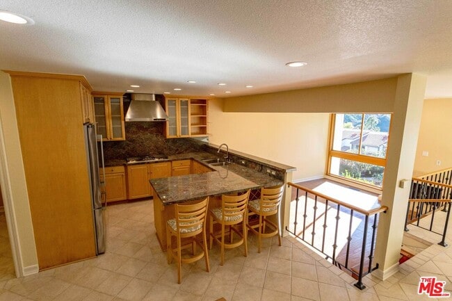 17097 Palisades Cir in Los Angeles, CA - Building Photo - Building Photo