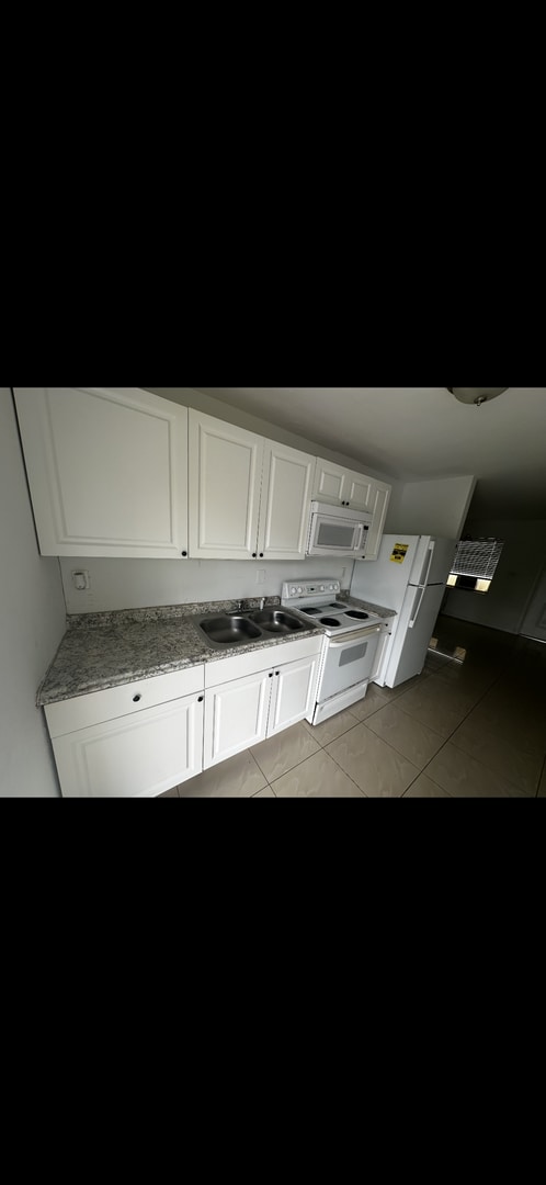 property at 809 Ave G