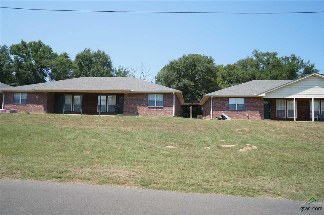 900 S Jackson St in Jacksonville, TX - Building Photo