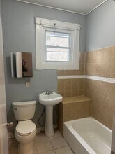 1406 Poplar Grove St in Baltimore, MD - Building Photo - Building Photo