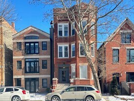 841 N Mozart St, Unit J04P in Chicago, IL - Building Photo