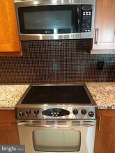 1580 Spring Gate Dr-Unit -4406 in McLean, VA - Building Photo - Building Photo