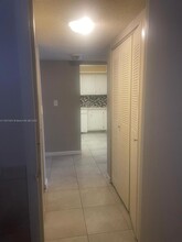 8311 Sands Point Blvd, Unit 105 in Tamarac, FL - Building Photo - Building Photo