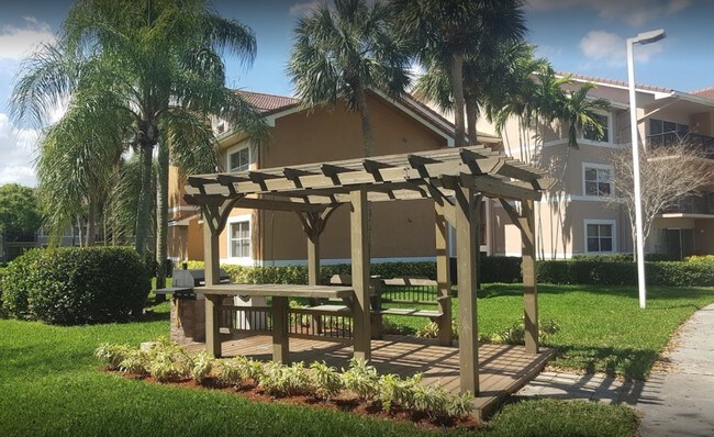 8931 Wiles Rd, Unit 4-102 in Coral Springs, FL - Building Photo - Building Photo