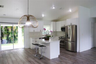 16930 W Mead Hill Dr in Westlake, FL - Building Photo - Building Photo