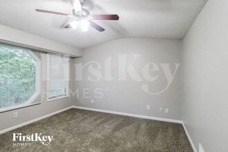 634 Woodsong Ln in Stone Mountain, GA - Foto de edificio - Building Photo