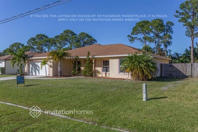 833 SE Lansdowne Ave in Port St. Lucie, FL - Foto de edificio - Building Photo
