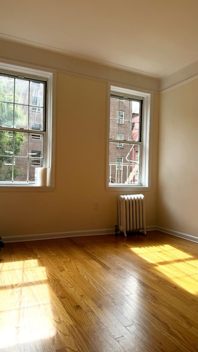 property at 117 W 13th St