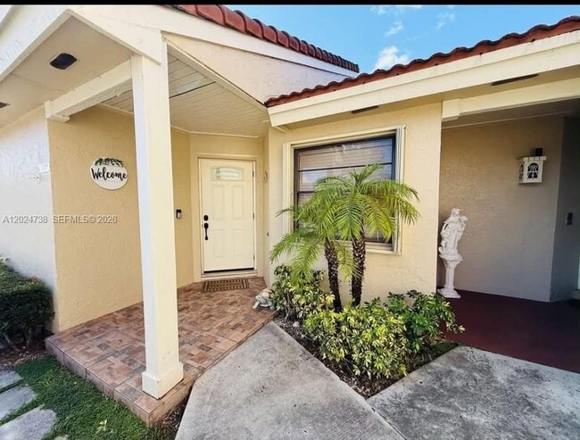 property at 6449 NW 171st St