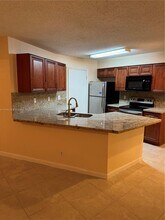 9999 Summerbreeze Dr in Sunrise, FL - Building Photo - Building Photo