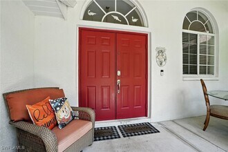 5891 Golden Oaks Ln in Naples, FL - Building Photo - Building Photo