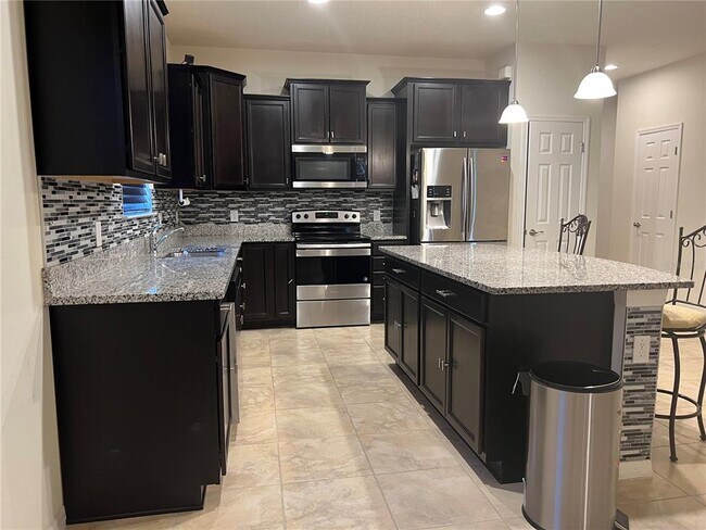 8584 Rindge Rd in Polk City, FL - Building Photo - Building Photo