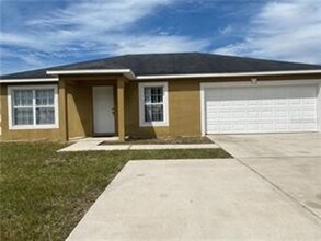 1922 Sawfish Dr in Poinciana, FL - Building Photo - Building Photo