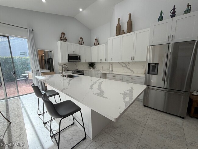 5950 Almaden Dr in Naples, FL - Building Photo - Building Photo