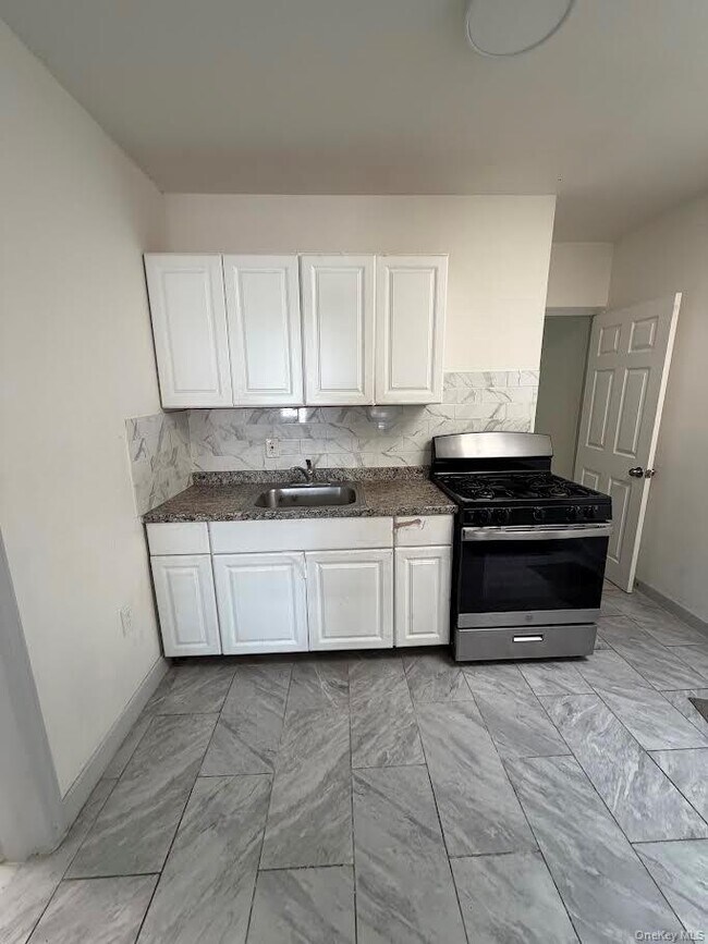 property at 215-19 Jamaica Ave