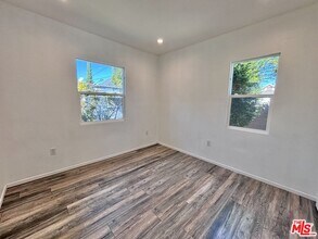 3774 S Gramercy Pl in Los Angeles, CA - Building Photo - Building Photo