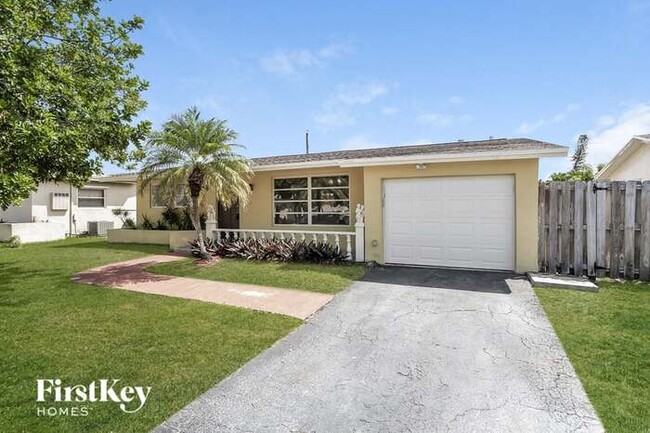 property at 9540 NW 25th St