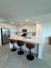 5555 Double Eager Cir in Ave Maria, FL - Building Photo - Building Photo