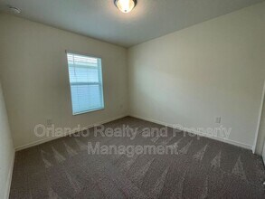 1529 Venice Ln in Davenport, FL - Foto de edificio - Building Photo